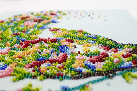 Siuvinėjimo karoliukais rinkinys „Dainuojantis paukštis“ 20×20 cm — Preciosa (Abris Art)