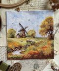 „Prie seno malūno“ – kryželiu siuvinėjimo komplektas, 19×19 cm - kaSiulai.lt