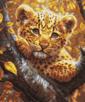 Siuvinėjimo komplektas kryželiu „Leopardo jauniklis aušroje“ 25×34 cm - kaSiulai.lt