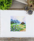 Siuvinėjimo komplektas kryželiu „Peizažas su cikorijomis“ 11×11 cm - kaSiulai.lt